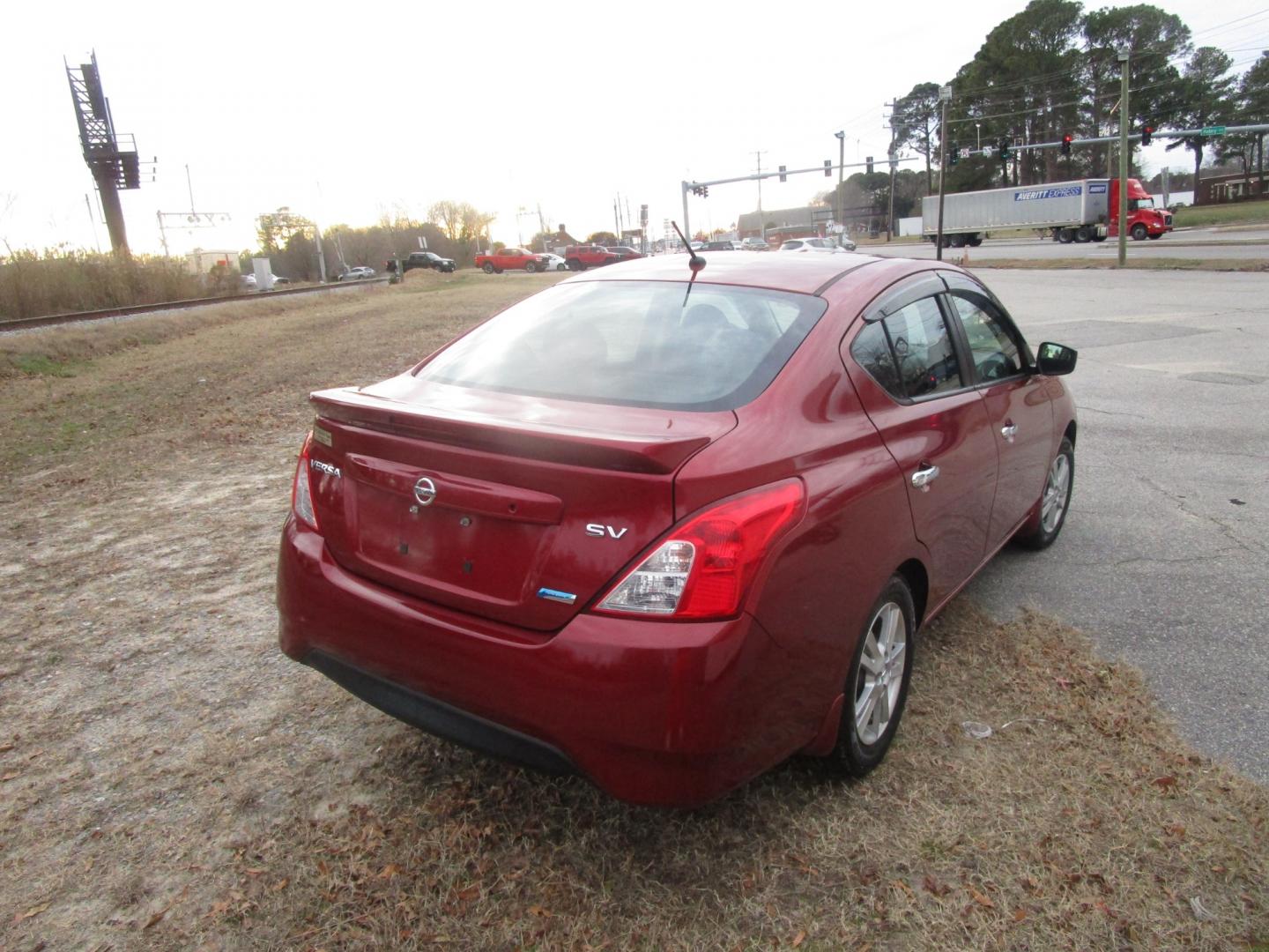 2016 Red Nissan Versa 1.6 S 5M (3N1CN7AP7GL) with an 1.6L L4 DOHC 16V engine, 5M transmission, located at 2553 Airline Blvd, Portsmouth, VA, 23701, (757) 488-8331, 36.813889, -76.357597 - Photo#5